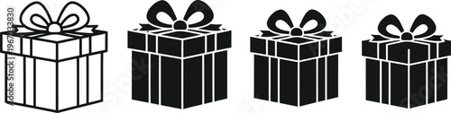 Four black gift boxes with bows in varying styles and sizes present ribbon