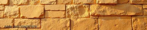 High-resolution image, imposing sandstone wall, sunlight detail, exterior, summer, historical