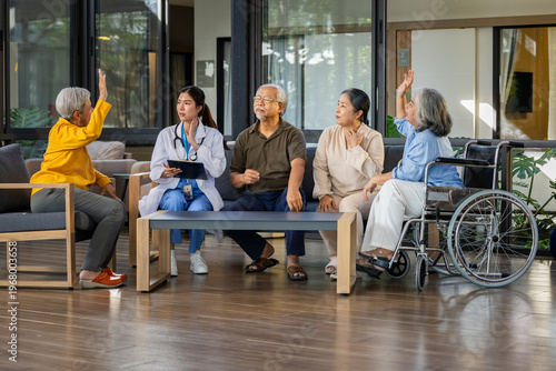 Young female doctor examining senior patient group in nursing home clinic looking happy raising hands asking question healthcare professional supporting elderly community wellbeing