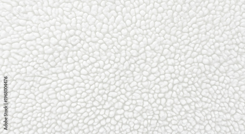 A close up of a white surface with small cracks