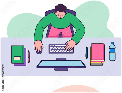 A man works on computer surrounded by office supplies at desk.