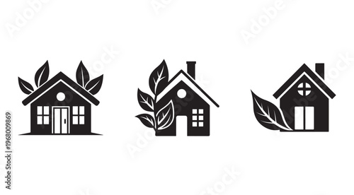 Eco friendly house icons with leaves  green home symbols  sustainable housing
