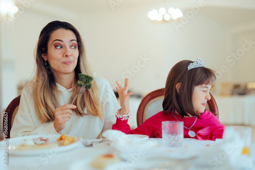 Obraz na plátně Girl Saying No to Broccoli While Mom While mom tries to convince her