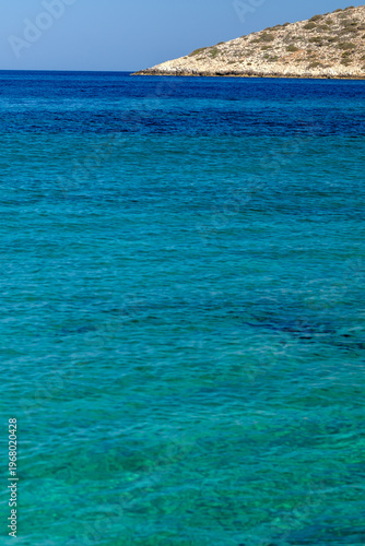 View of the beautiful  turquoise sandy dream beach of Agia Theodoti in Ios Greece