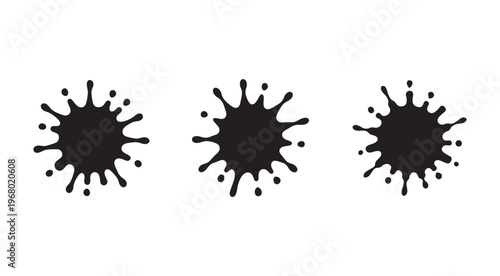 Three black ink splatters on white background  isolated inkblots  graphic design elements