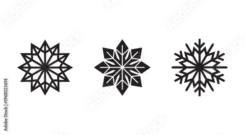 Three black snowflakes on white background winter seasonal geometric shapes