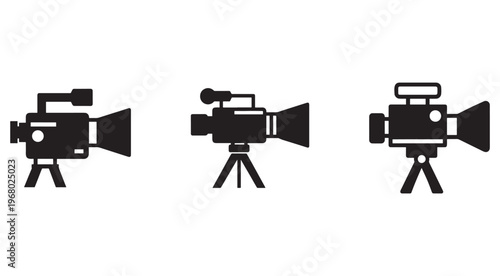 Three black video cameras on tripods for recording and filmmaking purposes  isolated on white background