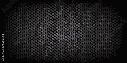 Dark textured background of a repeating diamond shaped grid pattern