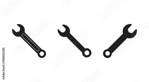 Three black wrenches on white background  adjustable tools for loosening and tightening bolts and nuts