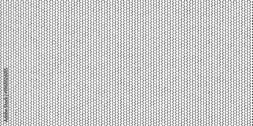 Close up of a repeating geometric pattern resembling woven fabric