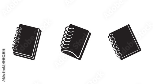 Three spiral bound notepads in different orientations on white background