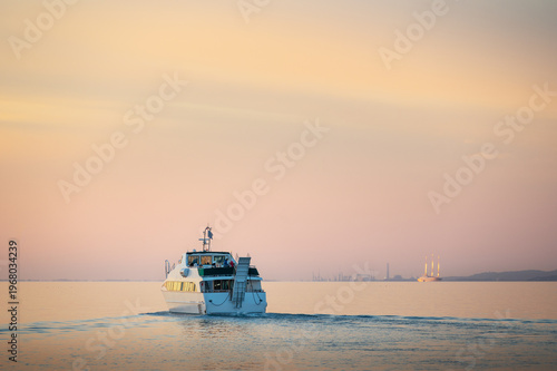 yacht boat on sea or ocean water during the sunset