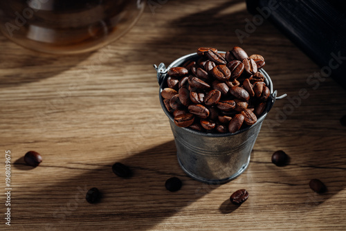 Rustic Bucket Filled with Fresh Coffee Beans on Wooden Table