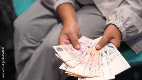 Banknote Singapore money Singapore dollar cash, (SGD) counting payment