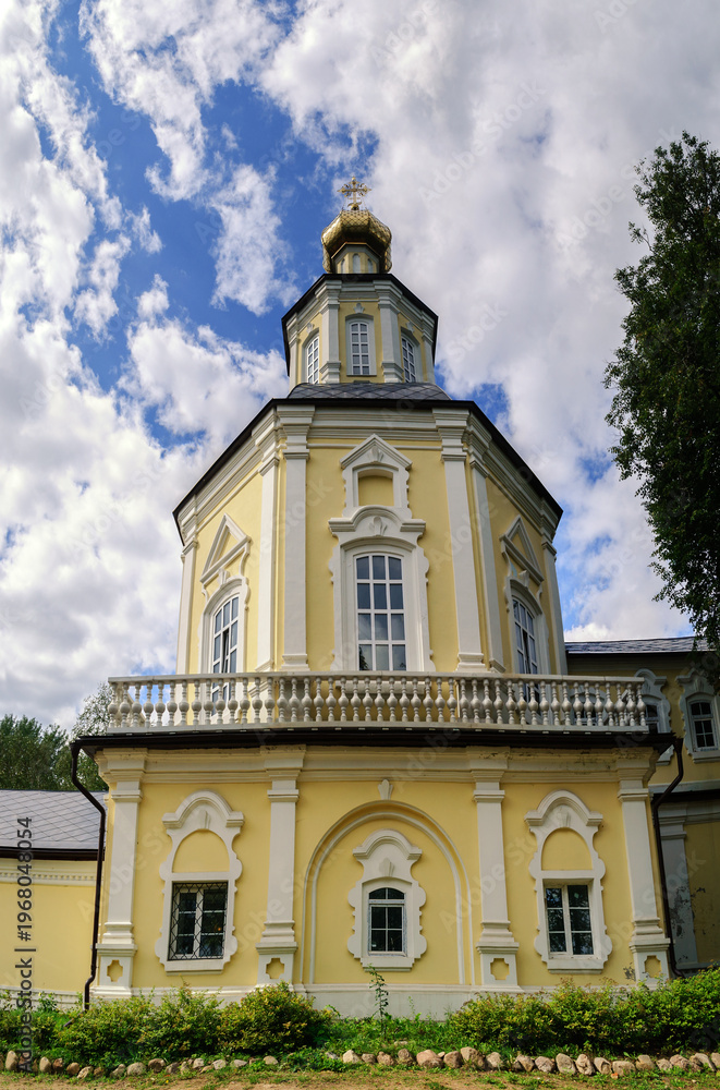 Fototapeta premium Church of St. John the Evangelist and St. Andrew in Ostashkov, Tver region, Russia, panoramic vertical view of an old orthodox landmark