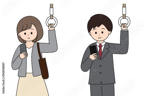 電車でスマートフォンを見るビジネスマンの男女