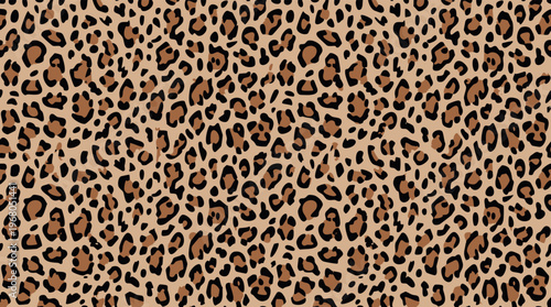 A seamless pattern of classic brown and black leopard animal print.