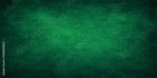 Abstract a textured emerald green backdrop with subtle, delicate details that brings a natural and organic feel. perfect for adding depth and intrigue to various creative projects.