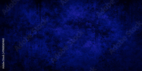 Abstract a textured, dark indigo background, evocative of depth, mystery, and artistic expression. Suitable for a range of design projects, creating an atmospheric feel.