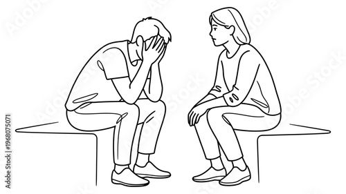 A distressed man covering his face while a woman sits opposite him offering support.