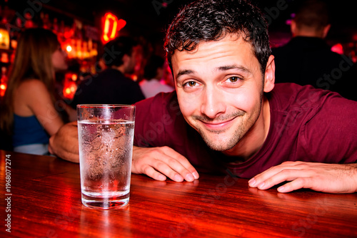 Man Choosing Water Over Alcohol at Bar