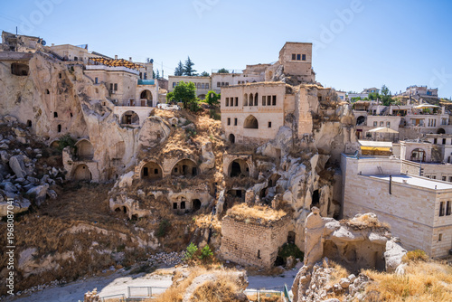 Modern houses among antique ruins. Ortahisar town in Cappadocia, Turkey.