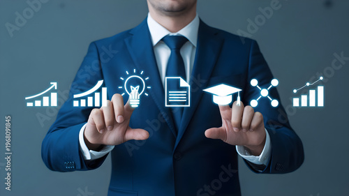 Successful businessman in blue suit touching digital growth charts and educational icons representing knowledge innovation and financial prosperity.