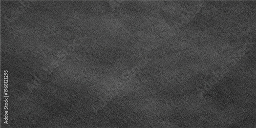 A textured, dark grey chalkboard background offering a vintage, scratched appearance, ideal for creative projects.