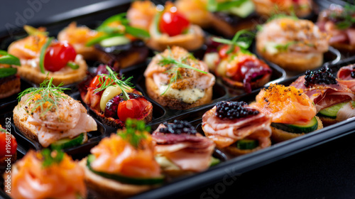 Close up of assorted finger food arranged in black catering tray, professional presentation, bright natural light, ultra-sharp commercial photography creative concept