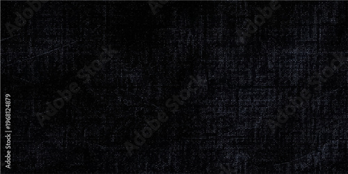 A textured black surface. 