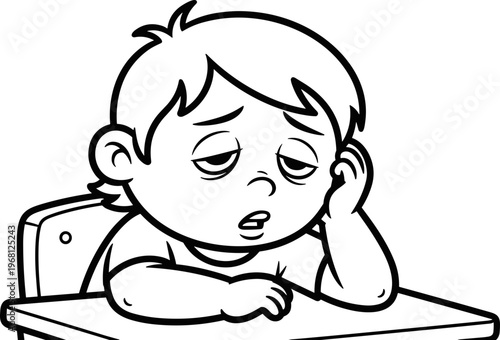 Bored child sitting at desk looking.