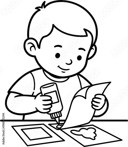 Boy applying glue to paper craft.
