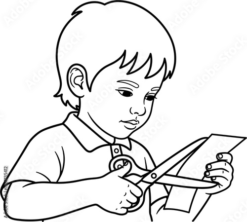 Boy cutting paper with scissors.