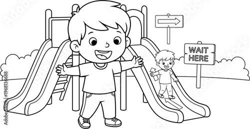 Happy little boy on playground slide.