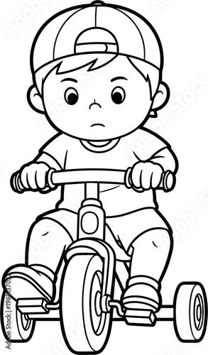 Little boy riding tricycle outdoors.