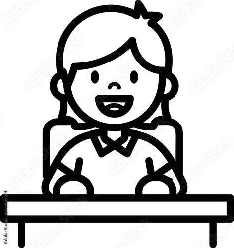 Smiling young girl sitting at desk.