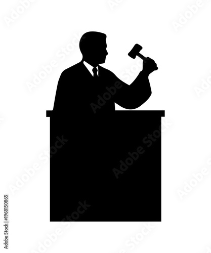 Judge or auctioneer hitting gavel at desk silhouette