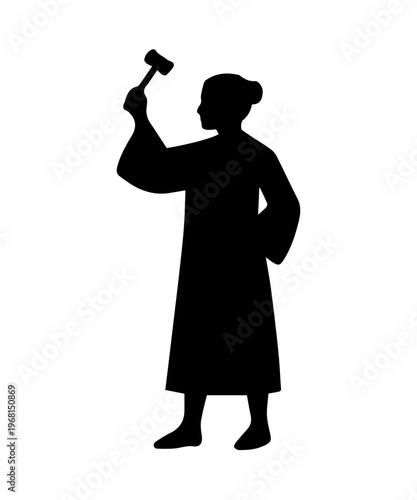 Silhouette of a female judge holding a gavel while standing indoors during a court session in the afternoon