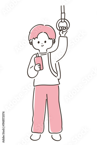 電車で吊り革を掴んでスマートフォンを見る若い男性