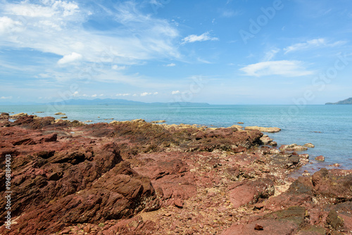 Sea waves lash line impact rock on the beach,View of a rocky coast