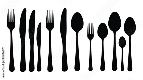 A collection of black cutlery including forks knives and spoons presented in a stark minimalist silhouette high quality professional detailed modern