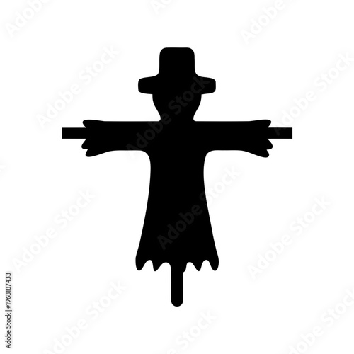 A solid black silhouette of a traditional scarecrow in a field