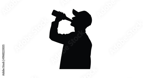 Man drinking from a bottle captured in stark black silhouette