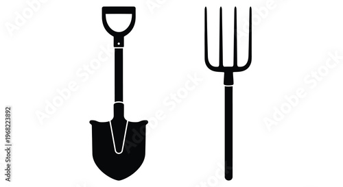 Black garden tools a spade and a pitchfork in silhouette