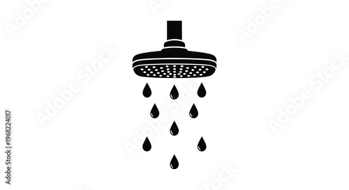 Black showerhead with falling water drops a striking silhouette