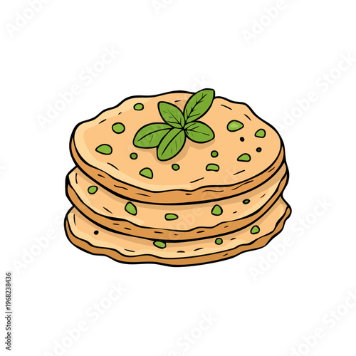 Stack of flatbreads topped with fresh green basil leaves and herbs