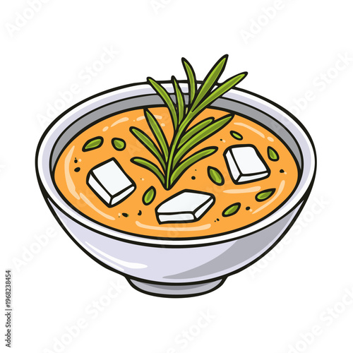 Delicious bowl of savory soup with fresh rosemary and cubes of cheese