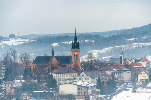 The church in the center of Jordanow in a winter setting