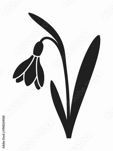 A black silhouette of a snowdrop flower
