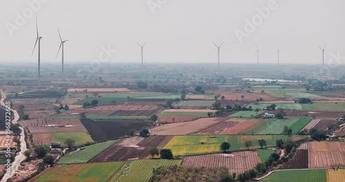 Wallpaper Mural Aerial view of Windmills/ Wind Turbines Operating in Rajkot, Gujarat, India. Renewable energy, Wind Energy Production, Wind Farm in India, Developing India Concept  Torontodigital.ca